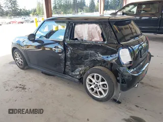 2021 MINI Hardtop Cooper with VIN WMWXR3C0XM2N93195, listed as a IAAI auction lot 42083421 with 46,269 mi miles and . Bid and sale history available at DreamBid. Image 3.