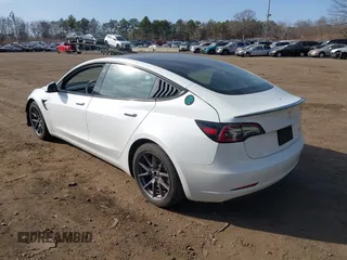 2021 Tesla Model 3 Long Range with VIN 5YJ3E1EB2MF858267, listed as a IAAI auction lot 41782360 with 79,671 mi miles and . Bid and sale history available at DreamBid. Image 3.