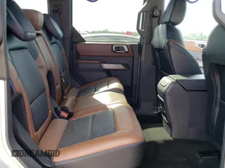2022 Ford Bronco z VIN 1FMEE5BP9NLB91319, wystawiony jako Copart lot #51629745 z przebiegiem 20 508 mil mil oraz Szkoda całkowita • Salvage title. Historia ofert i sprzedaży dostępna na DreamBid. Obrazek 11.