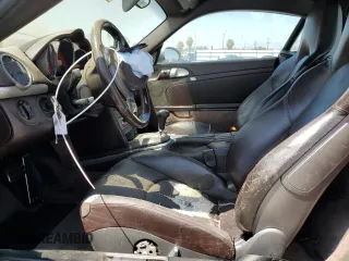 2006 Porsche Cayman S с VIN WP0AB298X6U784563, выставлен на аукционе Copart как лот 69819084 с пробегом 132 131 миль миль и Списание • Salvage title. История ставок и продаж доступна на DreamBid. Изображение 7.