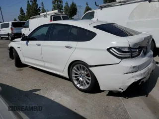 2017 BMW 5 Series GT 535i with VIN WBA5M2C59HG499197, listed as a Copart auction lot 57778334 with 52,552 mi miles and Salvage Title. Bid and sale history available at carsss.com. Image 2.