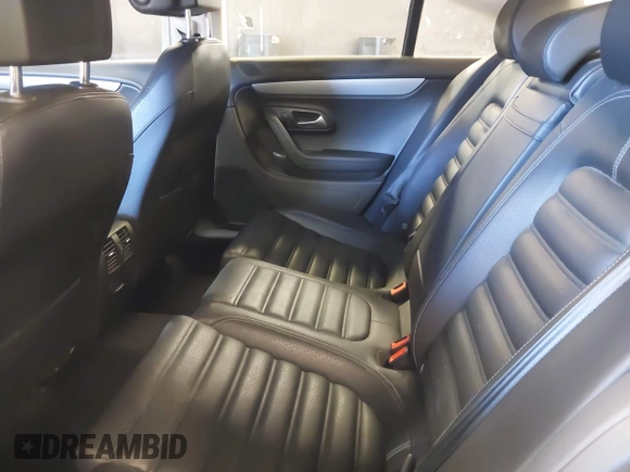 2015 Volkswagen CC R-Line with VIN WVWBP7AN8FE828106, listed as a IAAI auction lot 41867821 with 67,067 mi miles and . Bid and sale history available at DreamBid. Image 8.