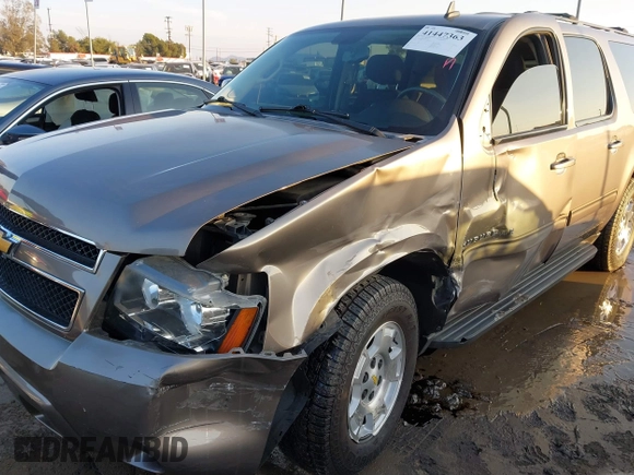 2012 Chevrolet Suburban LS with VIN 1GNSCHE0XCR143178, listed as a IAAI auction lot 41447363 with 96,197 mi miles. Bid and sale history available at carsss.com. Image 6.