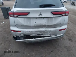 2022 Mitsubishi Outlander SE z VIN JA4J4UA8XNZ034643, wystawiony jako IAAI lot #41214966 z przebiegiem 52 827 mil mil oraz . Historia ofert i sprzedaży dostępna na DreamBid. Obrazek 6.