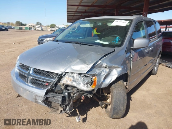 2015 Dodge Grand Caravan SXT with VIN 2C4RDGCG1FR649074, listed as a IAAI auction lot 41759409 with 116,856 mi miles and . Bid and sale history available at DreamBid. Image 2.