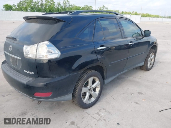 2008 Lexus RX with VIN 2T2HK31U38C064322, listed as a IAAI auction lot 42074366 with 241,459 mi miles. Bid and sale history available at carsss.com. Image 4.