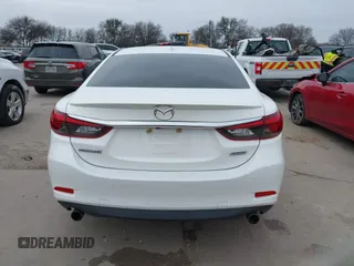 2017 Mazda 6 Grand Touring with VIN JM1GL1W57H1126716, listed as a IAAI auction lot 41619715 with 105,332 mi miles and . Bid and sale history available at DreamBid. Image 16.