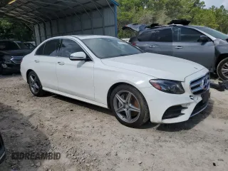 2017 Mercedes-Benz E 300 Luxury with VIN WDDZF4JB0HA010018, listed as a Copart auction lot 61529565 with Not provided miles and Salvage title. Bid and sale history available at DreamBid. Image 4.