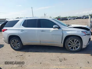 2020 Chevrolet Traverse High Country with VIN 1GNEVNKWXLJ135322, listed as a IAAI auction lot 42042466 with 105,748 mi miles and . Bid and sale history available at DreamBid. Image 13.