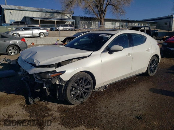 2020 Mazda Mazda3 Hatchback Premium Package with VIN JM1BPBNM9L1158444, listed as a Copart auction lot 49339575 with 93,329 mi miles and Salvage Title. Bid and sale history available at carsss.com. Image 1.