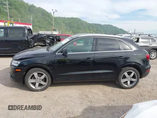 2015 Audi Q3 Prestige with VIN WA1GFCFS2FR009448, listed as a IAAI auction lot 42236056 with 147,644 mi miles and . Bid and sale history available at DreamBid. Image 14.