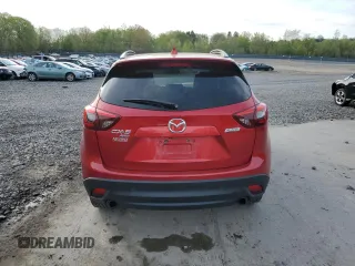 2016 Mazda CX-5 Grand Touring with VIN JM3KE4DY6G0753826, listed as a Copart auction lot 55391555 with 96,852 mi miles and Salvage Title. Bid and sale history available at DreamBid. Image 6.
