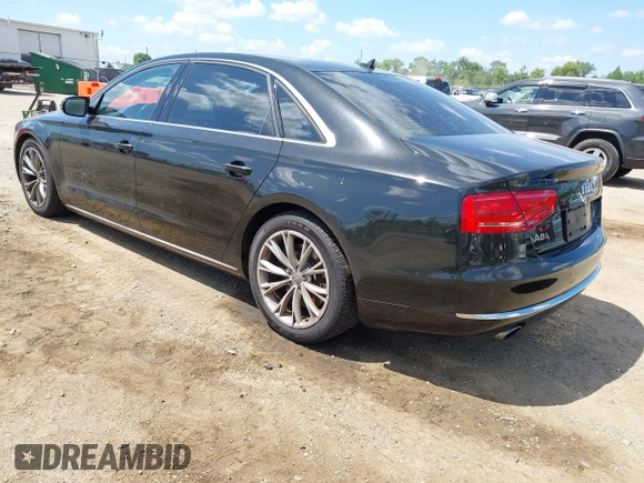 2011 Audi A8 with VIN WAURVAFD6BN005425, listed as a IAAI auction lot 42623409 with 264,365 mi miles and . Bid and sale history available at DreamBid. Image 3.