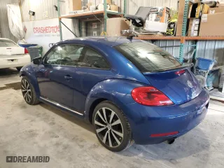 2012 Volkswagen Beetle 2.0T Turbo w/Sun/Sound PZEV with VIN 3VWVA7AT3CM659418, listed as a Copart auction lot 83652794 with 82,986 mi miles and Salvage Title. Bid and sale history available at carsss.com. Image 2.