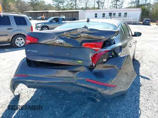 2013 Kia Optima LX with VIN 5XXGM4A77DG157034, listed as a IAAI auction lot 41870513 with 142,433 mi miles and . Bid and sale history available at carsss.com. Image 6.