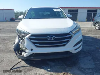2018 Hyundai Tucson SE with VIN KM8J23A42JU627533, listed as a IAAI auction lot 41880112 with 61,840 mi miles. Bid and sale history available at carsss.com. Image 13.