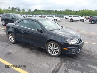 2015 Volkswagen Eos Komfort with VIN WVWBW8AH5FV004034, listed as a IAAI auction lot 41981978 with 106,450 mi miles and . Bid and sale history available at DreamBid. Image 1.
