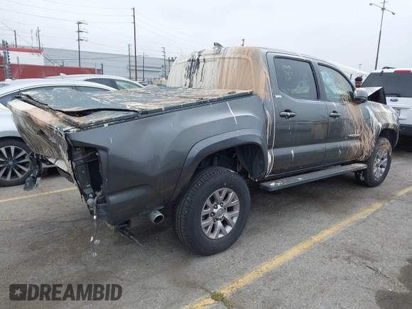 2017 Toyota Tacoma SR5 z VIN 3TMAZ5CN0HM039730, wystawiony jako IAAI lot #42406448 z przebiegiem 69 530 mil mil oraz . Historia ofert i sprzedaży dostępna na DreamBid. Obrazek 4.