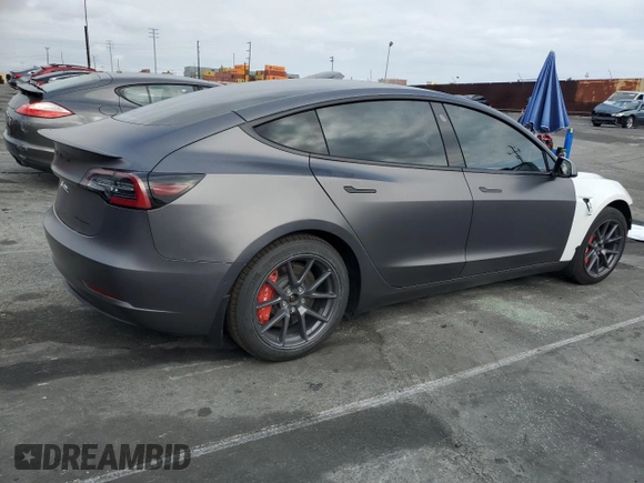 2021 Tesla Model 3 Long Range z VIN 5YJ3E1EB3MF003786, wystawiony jako Copart lot #55252355 z przebiegiem 32 443 mil mil oraz Szkoda całkowita • Salvage title. Historia ofert i sprzedaży dostępna na DreamBid. Obrazek 3.