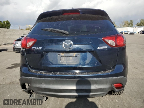 2016 Mazda CX-5 Sport with VIN JM3KE2BY0G0730906, listed as a Copart auction lot 51611865 with 207,166 mi miles and Salvage Title. Bid and sale history available at carsss.com. Image 6.