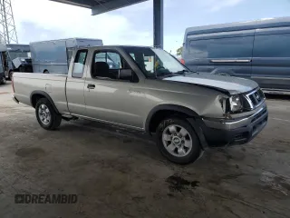 1998 Nissan Frontier XE with VIN 1N6DD26S8WC370482, listed as a Copart auction lot 52017845 with 46,572 mi miles and Salvage title. Bid and sale history available at DreamBid. Image 4.