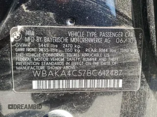 2011 BMW 7 Series 740i with VIN WBAKA4C57BC612487, listed as a Copart auction lot 82633554 with 0 mi miles and Salvage Title. Bid and sale history available at carsss.com. Image 12.