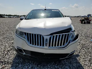 2011 Lincoln MKX z VIN 2LMDJ8JKXBBJ32276, wystawiony jako Copart lot #55921665 z przebiegiem 138 227 mil mil oraz Szkoda całkowita • Salvage title. Historia ofert i sprzedaży dostępna na DreamBid. Obrazek 5.