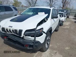 2019 Jeep Cherokee Trailhawk Elite with VIN 1C4PJMBX4KD351261, listed as a IAAI auction lot 41944727 with 97,849 mi miles. Bid and sale history available at carsss.com. Image 12.