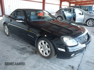 2003 Mercedes-Benz SLK-Class 2.3L with VIN WDBKK49F53F284534, listed as a IAAI auction lot 41325020 with 152,956 mi miles. Bid and sale history available at carsss.com. Image 1.