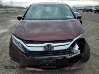 2019 Honda Odyssey EX-L with VIN 5FNRL6H70KB130948, listed as a Copart auction lot 52686395 with 35,632 mi miles and Salvage Title. Bid and sale history available at DreamBid. Image 5.