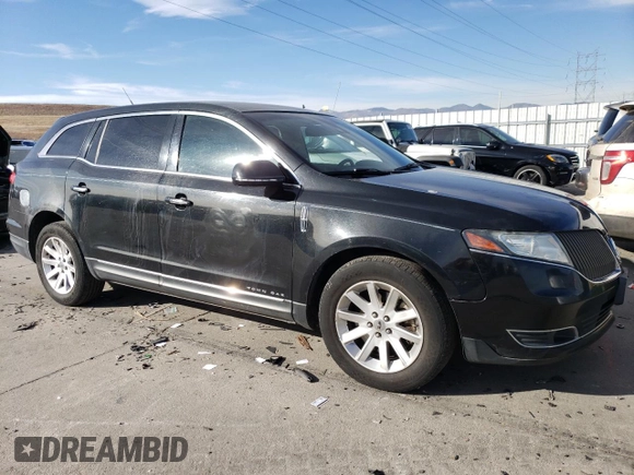 2015 Lincoln MKT with VIN 2LMHJ5NK0FBL03357, listed as a Copart auction lot 87189024 with 228,046 mi miles and Salvage Title. Bid and sale history available at carsss.com. Image 4.