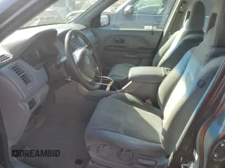2005 Honda Pilot LX z VIN 2HKYF18165H550737, wystawiony jako Copart lot #52793585 z przebiegiem 229 982 mil mil oraz Szkoda całkowita • Salvage title. Historia ofert i sprzedaży dostępna na DreamBid. Obrazek 7.