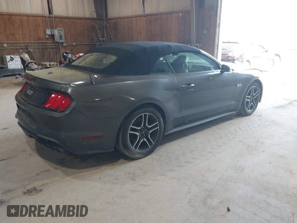 2019 Ford Mustang GT Premium with VIN 1FATP8FF4K5171686, listed as a IAAI auction lot 42073812 with 128,768 mi miles. Bid and sale history available at carsss.com. Image 4.