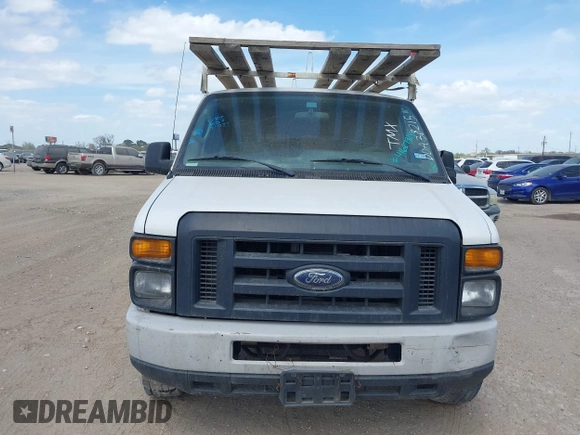 2013 Ford Econoline Cargo Commercial with VIN 1FTSE3EL4DDA38215, listed as a IAAI auction lot 41627924 with 181,821 mi miles. Bid and sale history available at carsss.com. Image 12.