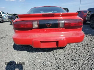 1996 Pontiac Firebird Firebird z VIN 2G2FS22KXT2220333, wystawiony jako Copart lot #77640324 z przebiegiem 89 032 mil mil oraz Nie do naprawy • Non repairable. Historia ofert i sprzedaży dostępna na DreamBid. Obrazek 6.