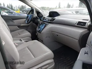 2016 Honda Odyssey EX-L with VIN 5FNRL5H60GB070789, listed as a IAAI auction lot 42148249 with 64,691 mi miles. Bid and sale history available at carsss.com. Image 5.