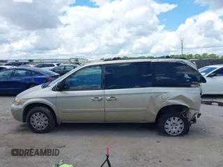2006 Chrysler Town & Country LX z VIN 2A4GP44R76R615521, wystawiony jako IAAI lot #42231279 z przebiegiem 270 399 mil mil oraz . Historia ofert i sprzedaży dostępna na DreamBid. Obrazek 14.