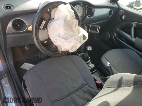 2005 MINI Convertible with VIN WMWRF33555TF62593, listed as a Copart auction lot 48305985 with 172,839 mi miles and Salvage title. Bid and sale history available at DreamBid. Image 8.