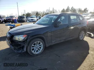 2015 BMW X1 xDrive28i with VIN WBAVL1C50FVY25782, listed as a Copart auction lot 42871465 with 116,084 mi miles and Salvage Title. Bid and sale history available at carsss.com. Image 1.