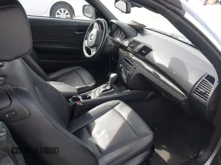 2012 BMW 1 Series 128i with VIN WBAUN1C52CVR00421, listed as a IAAI auction lot 41594256 with 107,957 mi miles and . Bid and sale history available at DreamBid. Image 5.