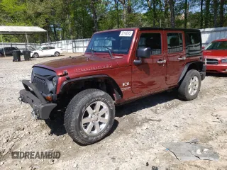 2007 Jeep Wrangler Unlimited X with VIN 1J4GB391X7L224756, listed as a Copart auction lot 52149345 with 163,630 mi miles and Salvage title. Bid and sale history available at DreamBid. Image 1.