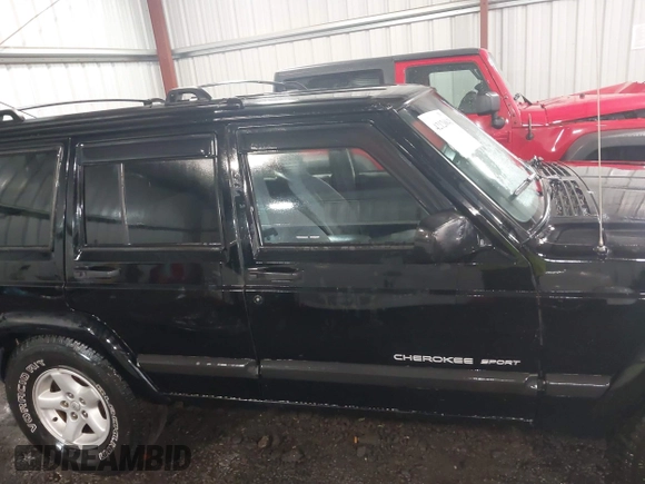 2000 Jeep Cherokee z VIN 1J4FF48S8YL216995, wystawiony jako IAAI lot #42126841 z przebiegiem 178 000 mil mil oraz . Historia ofert i sprzedaży dostępna na DreamBid. Obrazek 13.