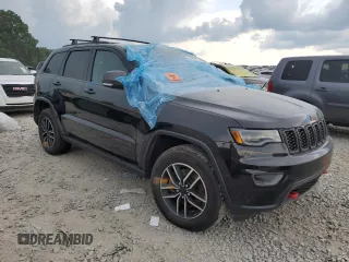 2020 Jeep Grand Cherokee Trailhawk with VIN 1C4RJFLT2LC296476, listed as a Copart auction lot 62125625 with 75,642 mi miles and Salvage title. Bid and sale history available at DreamBid. Image 4.