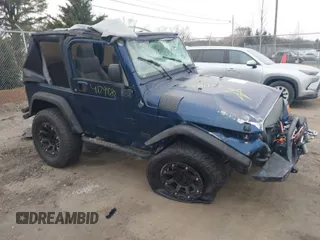 2003 Jeep Wrangler X with VIN 1J4FA39S23P300447, listed as a IAAI auction lot 41791733 with 165,576 mi miles. Bid and sale history available at carsss.com. Image 1.