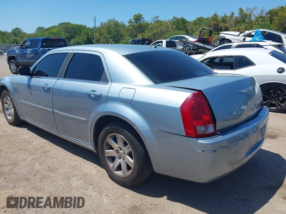 2006 Chrysler 300 Touring with VIN 2C3KA53G56H324954, listed as a IAAI auction lot 42058478 with 124,933 mi miles. Bid and sale history available at carsss.com. Image 3.