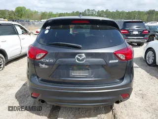 2016 Mazda CX-5 Touring with VIN JM3KE2CYXG0647921, listed as a IAAI auction lot 41948068 with 133,733 mi miles and . Bid and sale history available at DreamBid. Image 16.