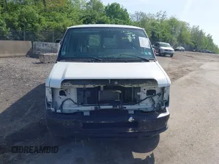 2014 Ford Econoline Cargo Commercial with VIN 1FTNS2EW2EDA83939, listed as a IAAI auction lot 42159453 with 148,947 mi miles. Bid and sale history available at carsss.com. Image 12.