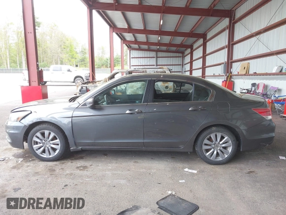 2011 Honda Accord EX with VIN 1HGCP2E73BA072027, listed as a IAAI auction lot 42229992 with 159,818 mi miles and . Bid and sale history available at DreamBid. Image 14.