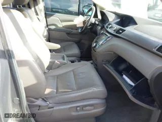 2015 Honda Odyssey Touring Elite with VIN 5FNRL5H90FB097984, listed as a IAAI auction lot 41822726 with 107,322 mi miles. Bid and sale history available at carsss.com. Image 5.