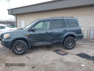 2006 Honda Pilot EX with VIN 5FNYF18426B014815, listed as a IAAI auction lot 42109149 with 284,163 mi miles and . Bid and sale history available at DreamBid. Image 14.